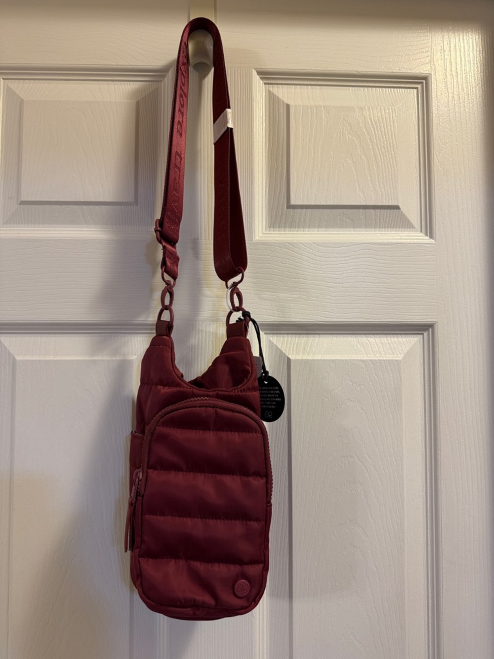 NWT Quilted water bottle Crossbody in Burgundy by Samantha Brown